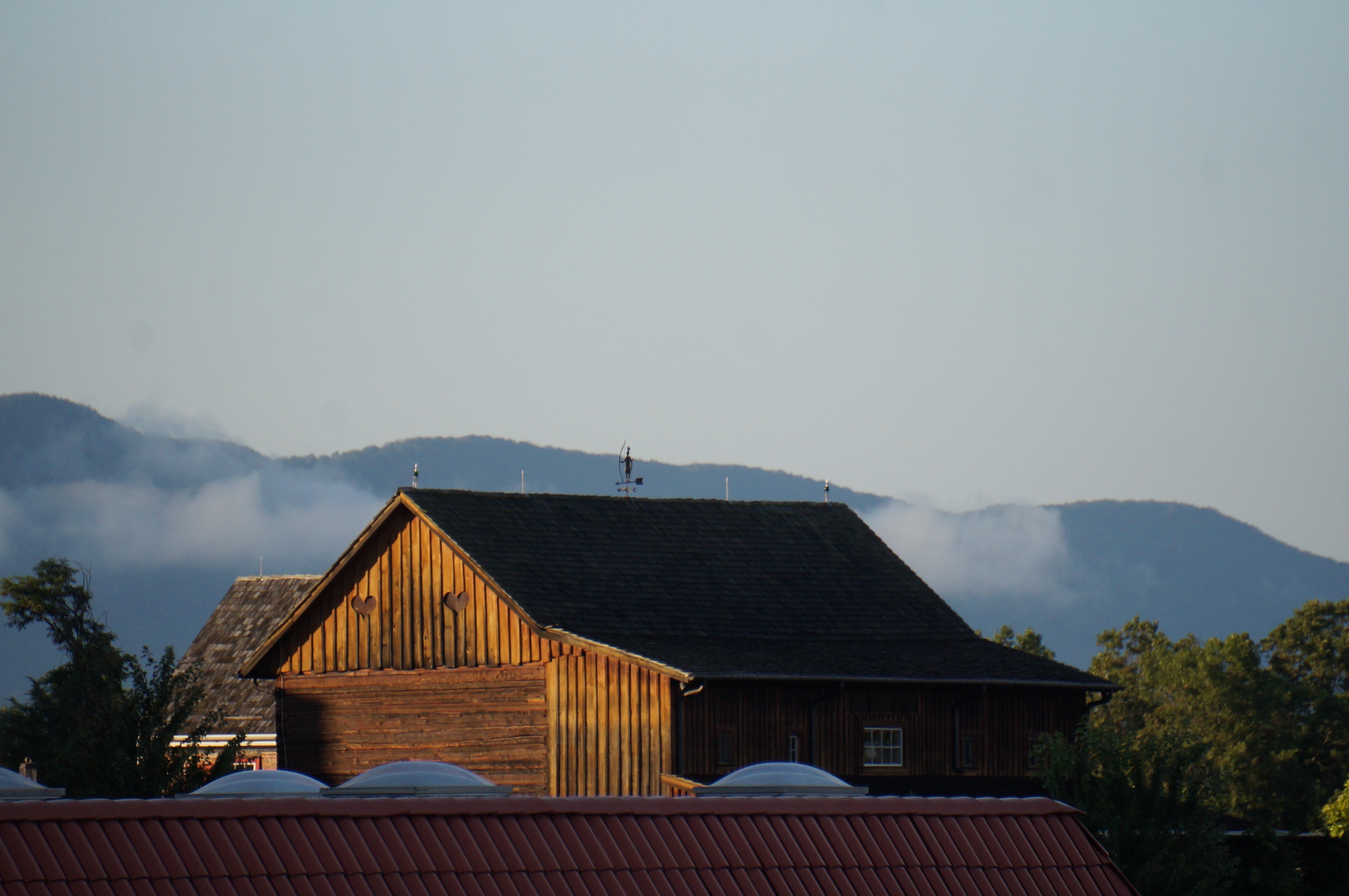 Barn in misty hills
