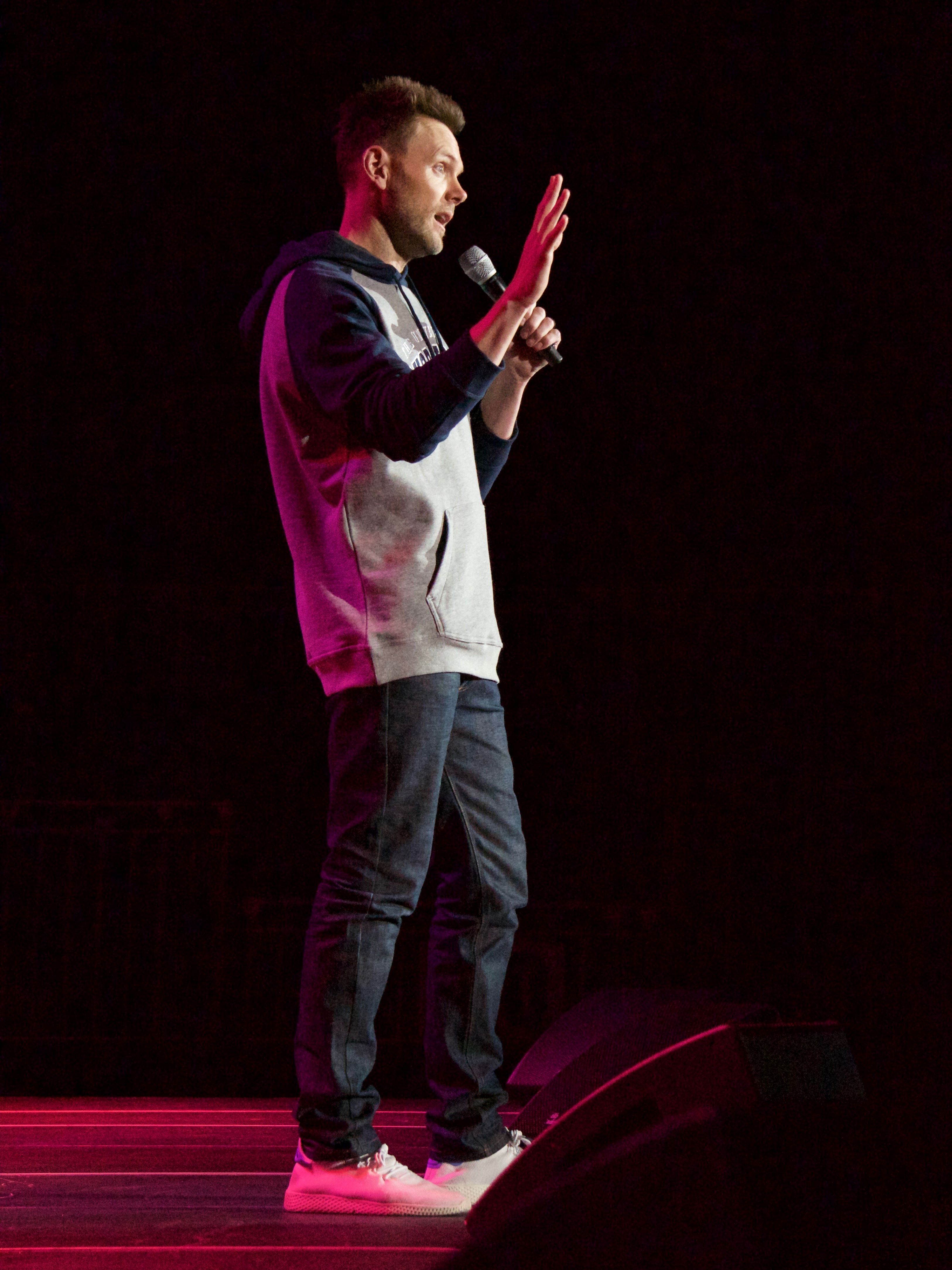 Standup comedian verticle.